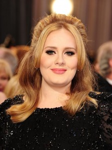 Adele's new album. File photo dated 2/02/13 of Adele who has given an insight into her third album, describing it as a "make-up record". Issue date: Wednesday October 21, 2015. In a Facebook and Twitter post, three days after she teased a song snippet during an ad break on The X Factor, the Rolling In The Deep star also officially confirmed the follow-up to 2011's 19 will be titled 25. See PA story SHOWBIZ Adele. Photo credit should read: Ian West/PA Wire URN:24500358