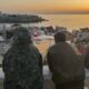 Policía española empieza el traslado migrantes a carpas puerto Ceuta